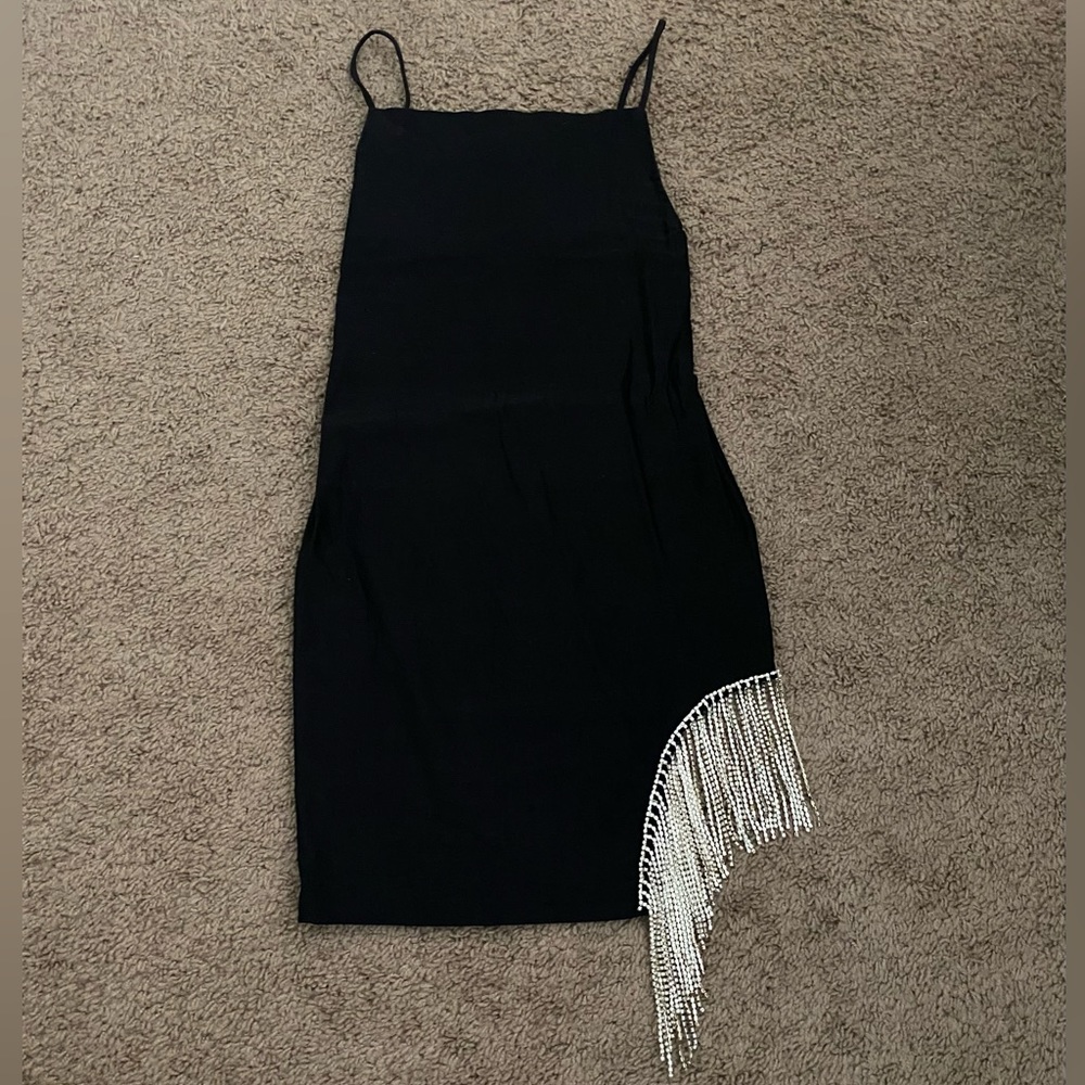 Spaghetti strap rhinestone detail dress.